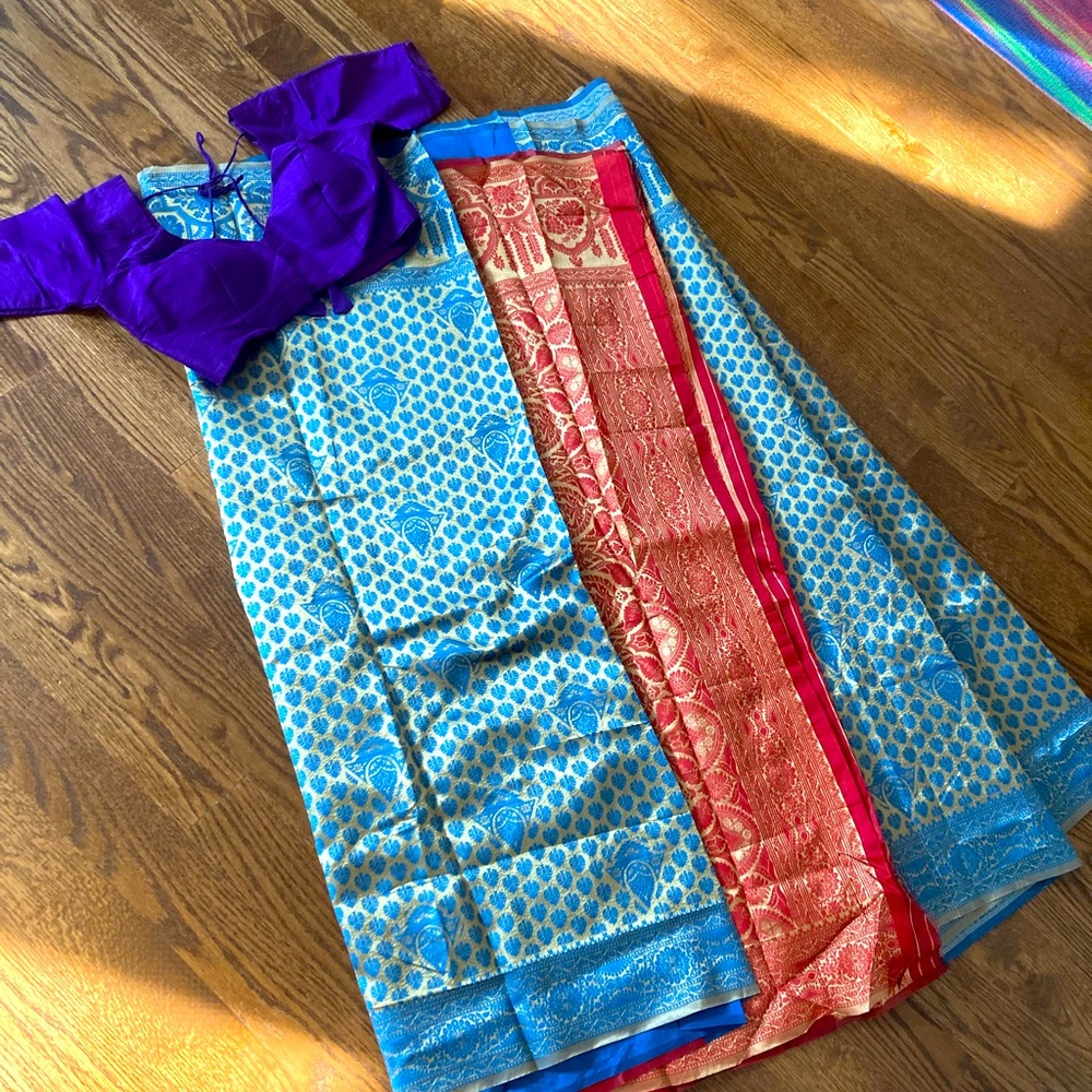 Blue saree with red border and blouse